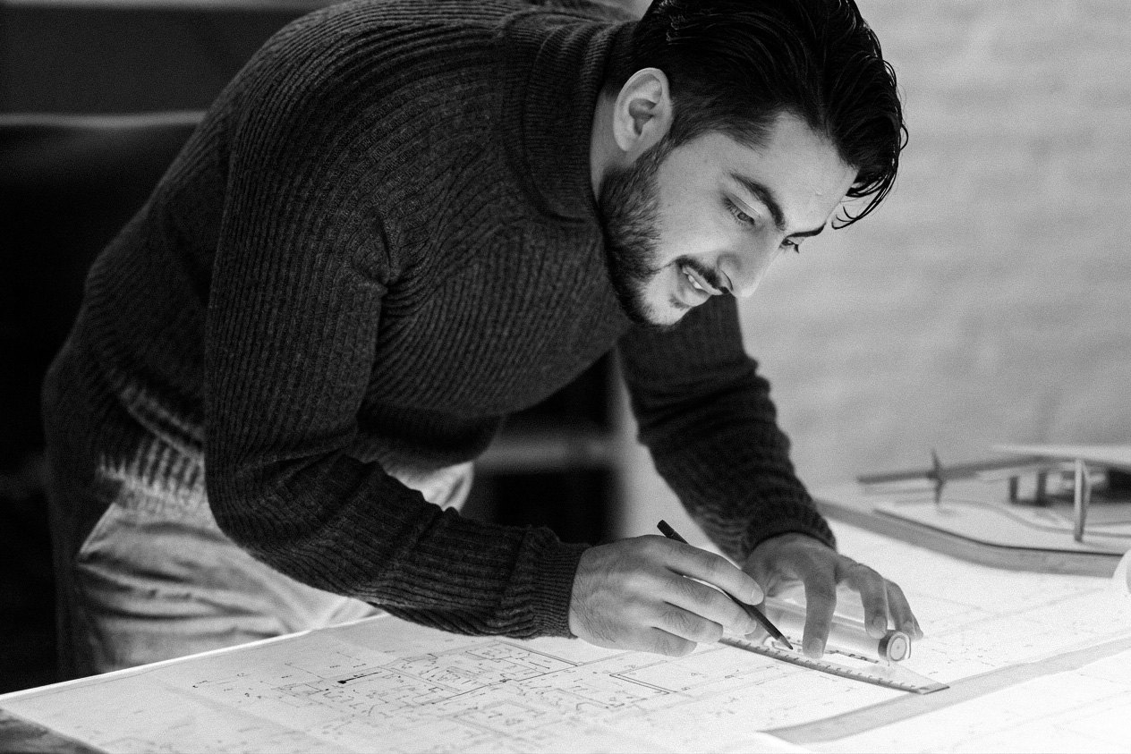 Director working on technical drawings at the FADP studio